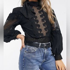 Black lace blouse. Never worn.